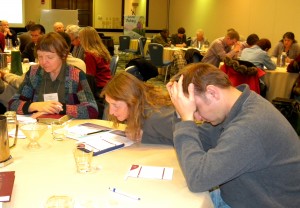 Participants at the conference of the Association of Lutheran Mission Agencies pray for one another's ministries. (LCMS Communications/Paula Schlueter Ross)