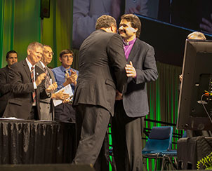 LCMS President Rev. Dr. Matthew C. Harrison greets Bishop Vsevolod Lytkin of the Siberian Evangelical Lutheran Church after delegates affirmed the church bodies’ fellowship. (LCMS Communications)