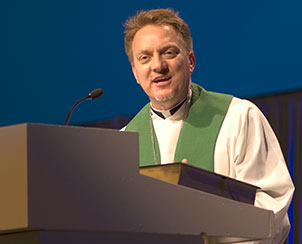 The Rev. Gregory Seltz preaches on the baptismal life to all those at the 65th Regular Convention of the LCMS on Monday afternoon. (LCMS Communications)