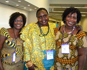 Heart to Heart Sisters, from left, Elizabeth Mayani, Viola Lupai and Suzan Taban — members of Trinity Lutheran Church in Lansing, Mich. — told Reporter they enjoy talking with women from other states and countries at the biennial conventions. (LCMS Communications/Paula Schlueter Ross)