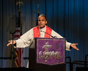The Rev. Dr. Dien Ashley Taylor of Redeemer Lutheran Church, Bronx, N.Y., preaches to more than 3,100 worshipers during the 35th Biennial Convention of The Lutheran Women's Missionary League in Pittsburgh. (Lutheran Women's Missionary League/BBM Photo)