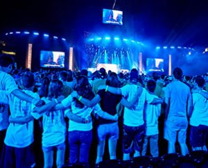 Participants at the LCMS National Youth Gathering join together for a special July 4 Mass Event at the Alamodome to unpack the day's theme, "live LOVED." (Nathan Harrmann)