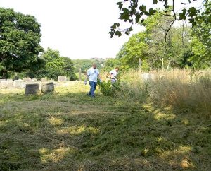 Many of the gravesites in the LCMS-owned Minersville Cemetery in Pittsburgh were not visible because of high weeds before a cleanup effort this summer. Volunteers from area Lutheran churches began a restoration of the cemetery in July and are now raising funds for more improvements. (Cheryl D. Naumann)