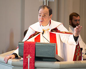 The Rev. Dr. Robert Bugbee, president of Lutheran Church—Canada, preaches during the installation service on 1 Cor. 1:22-25. He urged those present to "never let up" on preaching "Christ crucified" to long-time believers, unbelievers and "to ourselves — so that we might be believable servant-leaders whose work has real significance and the help of God's Holy Spirit."