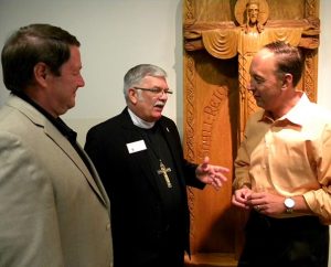 The three LCMS Board of Directors officers elected for the 2013-16 triennium get together during a break in the Board's Sept. 14-16 meeting in St. Louis. From left are Ed H. Everts, vice-chairman; the Rev. Michael L. Kumm, chairman; and Dr. Kurt M. Senske, executive committee member at-large. (LCMS Communications/Joe Isenhower Jr.)