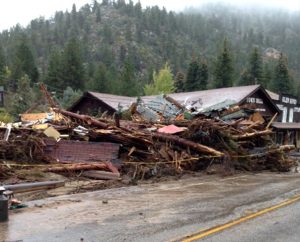 Debris from the floodwaters almost obscures the Town Hall in Glen Haven, Colo. As of Oct. 11, 2013, the Synod's Rocky Mountain District had distributed $7,600 in grants to provide gift cards, cash and supplies to families with flood damages. (Rocky Mountain District/Doug Ullmann)