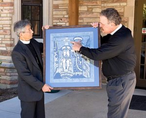 The Rev. Yutaka Kumei, president of the Japan Lutheran Church, left, presents a gift to LCMS President Rev. Dr. Matthew C. Harrison during the Service of Installation Sept. 14 at Concordia Seminary, St. Louis. The biblical print by Sadao Watanabe depicts the Holy Spirit descending on Jesus Christ at His Baptism. (LCMS Communications/Michael Schuermann)