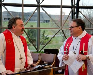 Before his Nov. 11 installation as assistant director of Broadcast Services for KFUO Radio, the Rev. Craig J. Donofrio, right, talks with LCMS President Rev. Dr. Matthew C. Harrison. (LCMS Communications/Frank Kohn)