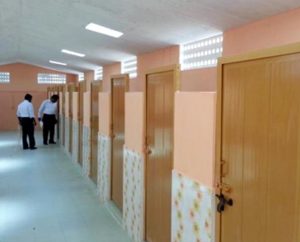 Project coordinators inspect new toilets at Concordia Higher Secondary School in Vaniyambadi, India. The facilities and a computer-training center were funded by a $40,800 grant from the LCMS’ India Lutheran Development and Relief Agency. (Ravi Jesupatham)