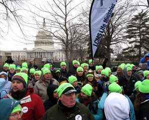 Green-capped Lutheran March for Life participants gather at the end of the march on Jan. 25, 2013, with the U.S. Capitol in the background. An LCMS group will be taking part in the 2014 march on Jan. 22. (Ed Szeto)
