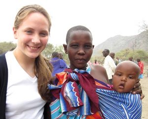 Louisa Mehl poses for a photo with a young Maasai woman and her child in a rural area of northeastern Tanzania on July 26, 2012, as part of a Lutheran World Relief fellowship for college students. (Mai Vu)