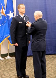 Brigadier General John McGoff of the Indiana National Guard pins the Purple Heart on Captain Michael Frese, an LCMS pastor. (Steve Blakey, BB Design Inc.)