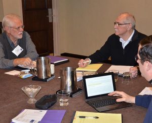 The Rev. Donald Pritchard of Pleasant Plains, Ill., left, makes a point during LCMS Specialized Pastoral Ministry’s (SPM) March 10-11 gathering in St. Louis of 10 emergency-services chaplains who beta-tested an ecclesiastical-endorsement process for such chaplains.  Listening are the Rev. Joel Hempel, center, the Synod’s manager of SPM, and the Rev. Frank Ruffatto of Charleston, W.Va. (LCMS Communications/Joe Isenhower Jr.)