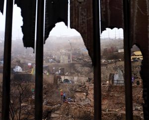 The former front door to a home frames a burned hillside in Valparaiso, Chile, on April 22. At press time, an LCMS Disaster Response team was in Chile to visit that site — where some 11,000 people are homeless as a result of wildfires — and Iquique, where an April 1 earthquake damaged more than 2,500 homes. The team and leaders of the Confessional Lutheran Church of Chile are planning a coordinated response that will include both spiritual care and emergency relief. (LCMS Communications/Erik M. Lunsford)