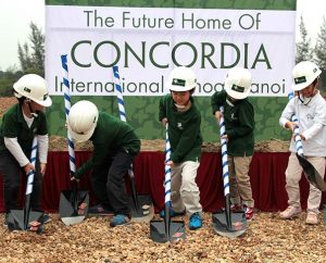 Kindergarten students at Concordia International School Hanoi ceremoniously "break ground" at the March 26 celebration of the start of construction for its permanent campus. Over the next 10 years the school will build facilities with 190,000 square feet of space that can accommodate 850 students in preschool through Grade 12. (Michael Gilliland)