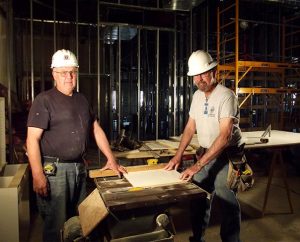 Don Michelson, left, of Munsing, Mich., and Rich Husfeld of Katy, Texas, members of LCEF’s Laborers For Christ, are working for Christ Lutheran Church in Albuquerque, N.M., to expand its day-school facilities. Husfeld is the project manager there. (Lutheran Church Extension Fund)