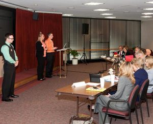 The team from Concordia University, Ann Arbor, Mich., has their 10-minute Q-and-A session with the judges at the third annual Lutheran Church Extension Fund National Student Marketing Competition. From left, the Ann Arbor team members are Robert Duff, Emily Bearman and Aaron Zalewski. Not shown is team member Paula Popa. (Lutheran Church Extension Fund)