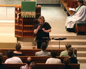 A student in the Church Interpreter Training Institute (CITI) "signs" during a chapel service at Concordia Theological Seminary, Fort Wayne, Ind. The 2014 CITI is planned for June 15-27 at the seminary. (Concordia Theological Seminary)