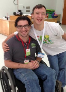 Andrew Vacca, left, director of the Boost Activity Night for Families with Disabilities at St. Paul Lutheran Church in Lakeland, Fla., gets a hug from one of the event's participants. The program recently received a $5,000 Joshua Grant from Wheat Ridge Ministries. (St. Paul Lutheran Church)