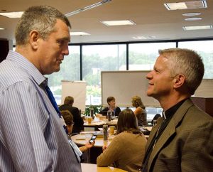 The Rev. Daniel Conrad, left, who will be serving as a missionary in Mexico, talks with the Rev. Randall L. Golter, executive director of the Office of International Mission, during the Synod's two-week missionary orientation in June. Conrad is one of 16 career missionaries called for service by the Board for International Mission at its May 30-31 meeting. (LCMS/Frank Kohn)