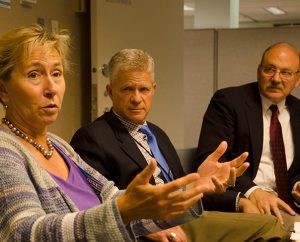 Dr. Mary Scott, left, provost and executive vice-president at Concordia University, Irvine, Calif., makes a point during the May 29 conference in St. Louis. Listening are the Rev. Randall L. Golter, center, executive director of the LCMS Office of International Mission, and the Rev. Dr. John Mehl, director of mission partnerships and church relations at Concordia University, Nebraska, Seward. (LCMS Communications/Frank Kohn)