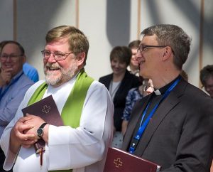 The Rev. James Krikava, left, and the Rev. Tony Booker, LCMS regional director for Eurasia, during Krikava’s service of installation on June 23 at the LCMS International Center in St. Louis.  Krikava will serve as associate regional director for Eurasia for the LCMS.   (LCMS/Frank Kohn)