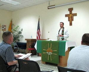 Chaplain Jim Buckman leads a Protestant Liturgical Worship Service at Al Udeid Air Base in Qatar. The service used Lutheran Service Book and employed the full-organ accompaniment for Divine Service, Setting One, from “The Concordia Organist” CD set, which was played each week on a laptop computer.