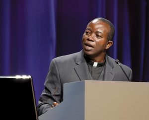 The Rev. Amos Bolay, president and bishop of the Evangelical Lutheran Church of Liberia and recipient of a Global Seminary Initiative scholarship, addresses the 2013 LCMS convention. (LCMS Communications)