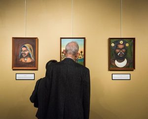 Tom and Ruth Donner browse artwork at the Papua New Guinea display at Concordia Historical Institute (CHI). The free exhibit runs through 2015 at CHI, located on the campus of Concordia Seminary, St. Louis. (LCMS/Erik M. Lunsford)