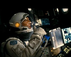 In the movie "Interstellar," Matthew McConaughey stars as Cooper, a former engineer and NASA pilot who leaves his family to pilot a spacecraft on an interstellar mission in an effort to save humanity.