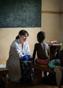 Dr. Katie Butler, a critical-care surgeon from Boxford, Mass., and a member of Our Savior Lutheran Church in Topsfield, Mass., listens to a young boy as she and fellow members of an LCMS Mercy Medical Team treat patients June 10 in Kakmega County, Kenya, East Africa. Medical professionals who volunteer to assist in the Synod's response to the Ebola outbreak in West Africa may receive up to $2,500 in travel funds. (LCMS/Erik M. Lunsford)