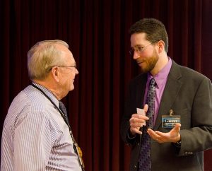 Dr. Ryan MacPherson, right, a professor at Bethany College and president of “Into Your Hands” consulting, talks with the Rev. Al Tormoehlen, director of The 72, part of the LCMS’ Witness & Outreach Ministry, during a break from the “Generational Generosity” summit Feb. 3 at the LCMS International Center. MacPherson presented findings from his recent study, which looked at underlying factors for the Synod’s membership decline. (LCMS/Frank Kohn)