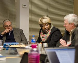 From left, the Rev. David J. Vaughn, business owner Pat Woods-Quinn and Bill Lapp of LCMS Mission Advancement take part in an urban-mission roundtable Feb. 20 at the Synod's International Center in St. Louis. (LCMS/Frank Kohn)