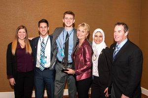 The Concordia University, St. Paul, Minn., team celebrates their first-place award at LCEF’s National Student Marketing Competition awards dinner April 10. The winning teammates are, from left, Hillary Minnaert, Thomas Obarski, Dillon LaHaye, marketing professor and faculty adviser Dr. Nancy Harrower, Nancy Mohammed and Brandon Wagner. (Lutheran Church Extension Fund)