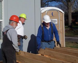 Laborers Mike Crain (from left), Marlow Schaefer and Dave Rohlf begin framing for the new Haskell LIGHT Campus Ministry Center in Lawrence, Kansas.  Lutheran Indian Ministries is participating in Lutheran Church Extension Fund’s Laborers For Christ to build the center that will serve students at the Haskell Indian Nations University. (Lutheran Church Extension Fund)