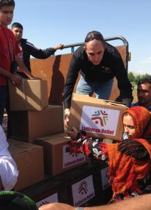 Lutheran Hour Ministries (LHM)—Lebanon’s Mark Rahme helps distribute much-needed provisions to Syrian refugees living in a Lebanese border community, a capability enhanced by donors' contributions to LCMS Mercy Operations and the Synod's Fund to Aid Christians Under Persecution. (Courtesy of Lutheran Hour Ministries)