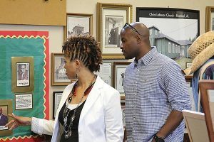 Kalonji Gilchrist, right, who played Rosa Young's father in "The First Rosa," and a friend tour the Dr. Rosa J. Young Historical Museum at Concordia College Alabama in Selma, Ala. (Meredith Jackson)