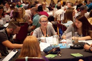 Maddie Upchurch, a Lutheran Youth Fellowship executive board member, and other youth-track participants at NATIONAL 15 reflect during group discussion on the adults in their congregations who have encouraged them in their faith lives. (Seth Hinz)