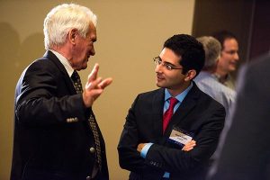 The Rev. Dr. John W. Kleinig (left), professor emeritus at Luther College, Adelaide, SA, Australia, chats with fellow speaker Sherif Girgis during the DOXOLOGY event "Finding Our Voice," Aug. 12 at Saint Louis University, St. Louis. (LCMS/Erik M. Lunsford)