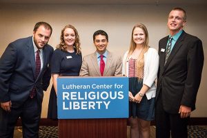 “Free to be Faithful” Young Adult Ambassadors stop for a picture with Sherif Girgis (center) after he addressed the recent Lutheran Center for Religious Liberty gathering in Washington, D.C., which focused on the theme "Let's Talk Marriage, Life and Religious Liberty." The Ambassadors are, from left, Joshua Lacey, Claire Houser, Bethany Glock and Isaiah Armbrecht. (LCMS/Erik M. Lunsford)