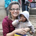 Dr. Maggie Karner holds a child during a 2010 Mercy Medical Team visit to Madagascar. Karner, director of LCMS Life and Health Ministries for 12 years, died Sept. 25 from brain cancer. (LCMS Health Ministry)