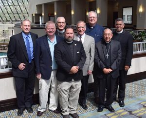 Participants in the Sept. 9-10 consultation between leaders of the LCMS and the North American Lutheran Church are, from left, the Rev. Dr. Joel Lehenbauer (LCMS), the Rev. John Pless (LCMS), the Rev. (Bishop) John Bradosky (NALC), the Rev. Dr. Albert Collver III (LCMS), the Rev. Mark Chavez (NALC), the Rev. Larry Vogel (LCMS), the Rev. Paull Spring (NALC) and the Rev. Dr. David Wendel (NALC). (Courtesy of Albert Collver III)