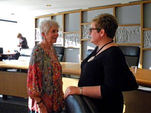 Board member Lois Peacock, left, talks with Karin Semler, executive director of the Asia Lutheran Education Association, during a break on Oct. 16. (LCMS/Megan K. Mertz)