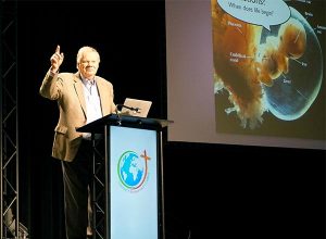 Dr. David Menton, speaker for Answers in Genesis and associate professor emeritus of anatomy at Washington University School of Medicine, St. Louis, gives an up-close look at the development of a child in the womb during his presentation at the 2015 Lutherans For Life National Conference. (LCMS/Megan K. Mertz)