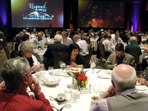 Participants enjoy sharing a laugh as they visit around tables at the 2015 Lutheran Church Extension Fund Fall Leadership Conference in Atlanta Nov. 20-22. (LCMS/Joe Isenhower Jr.)