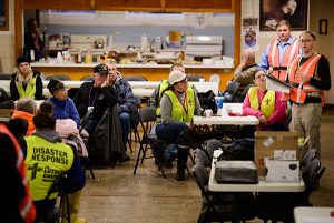 Stephen Born (far right), regional disaster-response coordinator for the LCMS Central Illinois District (CID), addresses volunteers before a cleanup event of flood-damaged homes Jan. 9 at Calvary Lutheran Church in Watseka, Ill. LCMS Disaster Response certified Born as a Lutheran Early Response Team trainer in 2014, and he, in turn, helped train hundreds of other CID responders. (LCMS/Erik M. Lunsford)