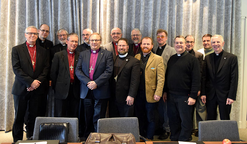 Participants in the Jan. 20 discussions in Gothenburg, Sweden among leaders of the Communion of Nordic Dioceses and the International Lutheran Council (ILC) are (from left, beginning with the front row): Rev. Roland Gustafsson, presiding bishop of the Swedish Mission Province; Rev. Lars Artman, assisting bishop for the Swedish Mission Province; Rev. Risto Soramies, bishop of the dean of the Evangelical Lutheran Diocese of Finland; Rev. Dr. Albert Collver, ILC executive secretary and LCMS Director of Church Relations; Rev. Jakob Okkels, assistant to the bishop of the Swedish Mission Province; Rev. Dr. Lawrence Rast, president of Concordia Theological Seminary, Fort Wayne, Ind., and chairman of the LCMS Commission on Theology and Church Relations; and Rev. Gijsbertus van Hattem, president of the Evangelical Lutheran Church in Belgium and secretary of the ILC. In the back row, from left, are Rev. Dr. Juhana Pohjalo, dean of the Evangelical Lutheran Diocese of Finland; Rev. Göran Beijer, assisting bishop of the Swedish Mission Province; Rev. Dr. Bengt Birgersson, general secretary for Swedish Mission Province; Rev. Hans-Jörg Voigt, bishop of the Independent Evangelical Lutheran Church of Germany and ILC chairman; Rev. Thor Henrik With, bishop of the Norwegian Mission Province; Rev. Jon Ehlers, chairman of the Evangelical Lutheran Church of England; Rev. Dr. Robert Bugbee, president of Lutheran Church—Canada and ILC vice-chairman; and Rev. Norberto Gerke, president of the Evangelical Lutheran Church of Paraguay. (International Lutheran Council)