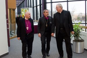 From left, Bishop Ray Sutton and Archbishop Foley Beach of the Anglican Church in North America and the Rev. Larry Vogel of the LCMS visit during a break in the Feb. 8-9 session of ongoing discussions involving their church bodies and Lutheran Church—Canada. (LCMS/Frank Kohn)