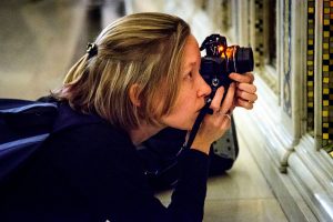 Melanie Sorenson, who will be going to Ethiopia with her husband, the Rev. Adam Sorenson, takes a photo at a photography workshop during the two-week missionary orientation in St. Louis. (LCMS/Frank Kohn)