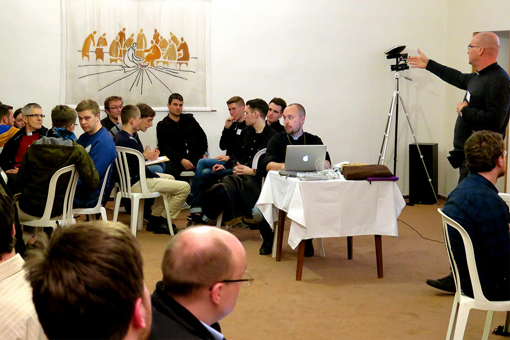 A spokesman shares about his small group’s thoughts and conclusions on a topic presented during the Feb. 12-14 Network of Young Lutheran Theologians conference near Prague. (Craig Donofrio)